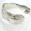Bracelet plume en métal argenté et doré