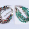 Bracelet multi rang en perles de rocaille et métal argenté