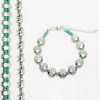 Bracelets en perles de verre turquoise et métal plaqué argent