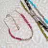 Chaine de cheville argentée en perles de verre et de rocaille
